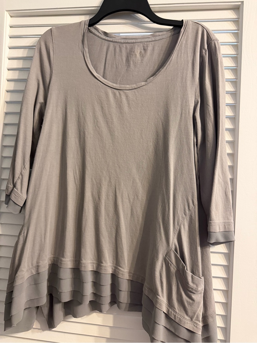 Logo by Lori Goldstein gray scoop neck top with chiffon hem.